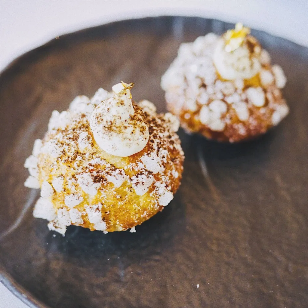 Chou buns offered by the house